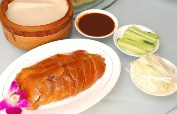 Peking Duck crispy skin wrapped in pancakes