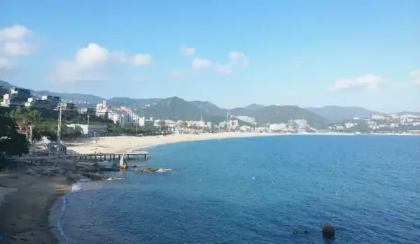 Dameisha Beach golden sand clear blue water popular beach in Shenzhen