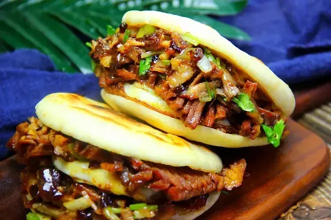 Roujiamo Chinese meat sandwich with braised pork in flatbread